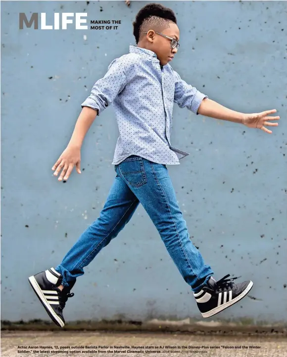  ?? JOSIE NORRIS / THE TENNESSEAN ?? MAKING THE MOST OF IT
Actor Aaron Haynes, 12, poses outside Barista Parlor in Nashville. Haynes stars as AJ Wilson in the Disney-plus series “Falcon and the Winter Soldier,” the latest streaming option available from the Marvel Cinematic Universe.