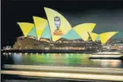  ?? GETTY IMAGES ?? The green and gold Ashes celebratio­ns are projected on the Sydney Opera House after Australia’s 40 victory.