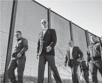  ?? Doug Mills/new York Times ?? President Joe Biden, seen with U.S. Border Patrol agents on Jan. 8 in El Paso, implemente­d a new plan that will have migrants schedule an appointmen­t to make asylum claims at a port of entry.