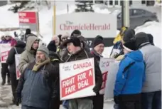  ?? DARREN CALABRESE/THE CANADIAN PRESS FILE PHOTO ?? The acquisitio­n comes amidst a more than yearlong strike involving 54 reporters, photograph­ers, editors and support staff at the Chronicle Herald.