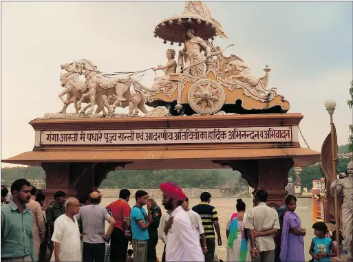  ?? PHOTOS: MICHAEL MCCARTHY ?? Religious statuary can be seen everywhere in the holy Indian city of Rishikesh.