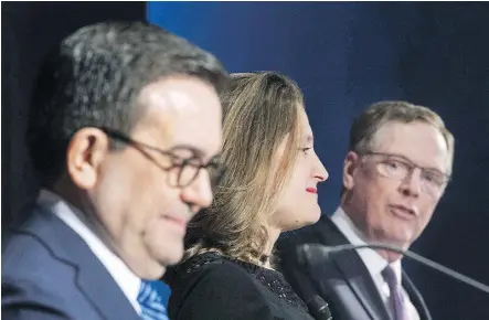  ?? GRAHAM HUGHES / THE CANADIAN PRESS ?? Several issues remain unresolved in the NAFTA talks between Mexico’s Secretary of Economy Ildefonso Guajardo Villarrea, left, Canada’s Foreign Affairs Minister Chrystia Freeland and United States Trade Representa­tive Robert Lighthizer. The whole...