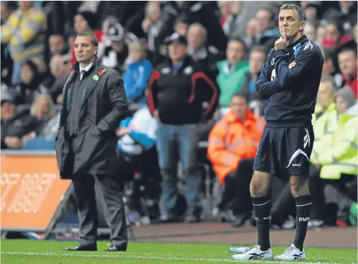  ??  ?? FLASHBACK: Owen Coyle, then manager of Bolton, and Brendan Rodgers, who managed Swansea, during the English Premier League match between the teams at Liberty Stadium in October 2011