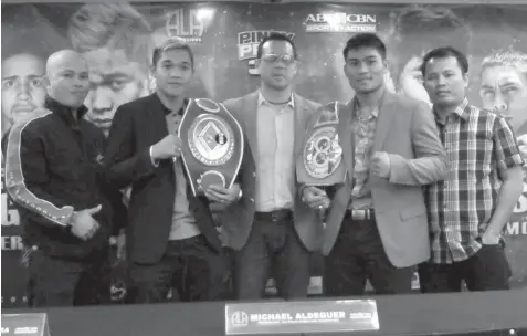  ?? PAUL JUN E. ROSAROSO ?? ALA Promotions President and CEO Michael Aldeguer (C) poses with undefeated ALA boxers 'Prince' Albert Pagara (second from left) and Mark 'Magnifico' Magsayo during the formal launching of the 'Pinoy Pride 35:Stars of the Future" fightcard yesterday at...