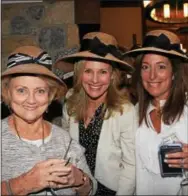  ??  ?? Joan Mullen of West Chester and Berwyn gals Janine Zozaya and Lisa Semerjian opt for straw hats with bows.