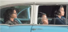  ??  ?? Katherine (Taraji P. Henson, left), Mary (Janelle Monáe) and Dorothy (Octavia Spencer) share the struggles of being black women in the white man’s world of NASA in the 1960s.