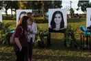  ?? Photograph: Saul Martinez/Getty Images ?? People visit a memorial on the 5th anniversar­y of the Marjory Stoneman Douglas high school mass shooting in February 2023.