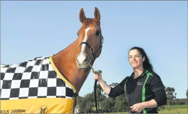  ??  ?? STAR RUNNER: Consol. Horsham jockey Holly Mckechnie with the Paul Preusker-trained Magic Picture: PAUL CARRACHER