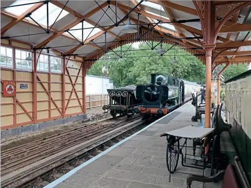  ?? Robert Thornton ?? Former GWR 0-6-0PT No. 4612 stands proudly just outside the canopy, thus allowing full appreciati­on of the fine timberwork of the framing, bargeboard­s and panelling, and the decorative cast iron spandrels supporting the roof members.