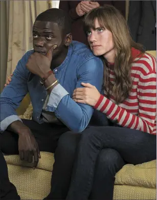  ??  ?? Daniel Kaluuya as Chris Washington and Allison Williams as Rose Armitage in GetOut.