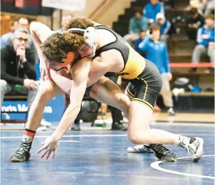  ?? AMY SHORTELL/THE MORNING CALL ?? Northampto­n’s Trent Wagner wrestles Freedom’s Nate Desmond in the 121-weight bout Saturday in the Northeast Regional Class 3A wrestling Saturday at Liberty.