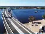  ?? —AFP ?? KAZUNGULA, Botswana: An aerial view of the newly built Kazungula bridge over the Zambezi river on Monday.