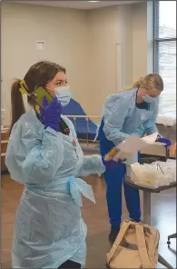  ?? (NWA Democrat-Gazette/Marc Hayot) ?? University of Arkansas Medical Sciences nursing student Brianna Willis calls for a bed for a ‘patient’ during the training.