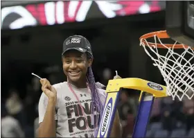  ?? AP PHOTO/GERRY BROOME, FILE ?? FILE - South Carolina forward Aliyah Boston (4) reacts after cutting the net following a college basketball game against Creighton in the Elite 8round of the NCAA tournament in Greensboro, N.C., Sunday, March 27, 2022.