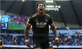  ??  ?? Adama Traoré celebrates scoring his second goal in Wolves’ Sunday win at Manchester City. Photograph: Lindsey Parnaby/AFP via Getty Images