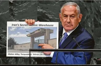  ?? Timothy A. Clary / AFP/Getty Images ?? “Why did Iran keep a secret atomic archive and secret atomic warehouse?” said Israeli Prime Minister Benjamin Netanyahu on Thursday at the U.N. “What Iran hides, Israel will find.”