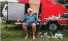  ?? Photograph: Natalie Grono ?? Beau Lyons has been living on the NSW border in his tiny camper for three weeks, waiting for an exemption to see his wife in Queensland.