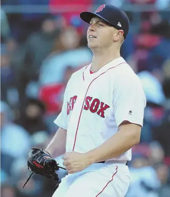  ?? STAFF PHOTO BY NANCY LANE ?? PUMPED: Bobby Poyner reacts after striking out Kevin Kiermaier to end the top of the 12th inning yesterday at Fenway Park.