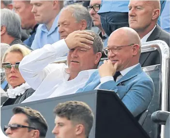  ??  ?? Mike Ashley watches Newcastle United with managing director, Lee Charnley