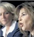  ?? JACQUES BOISSINOT/ THE CANADIAN PRESS ?? Diane Lemieux, president of the Commission de la Constructi­on du Quebec Quebec makes comments as Quebec Labour Minister Lise Theriault looks on during a press conference in Quebec City in 2011.
