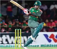  ?? AFP ?? Shakib Al Hasan of Bangladesh hits a boundary during the second T20i against West Indies on Saturday. —