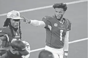  ?? MICHAEL AINSWORTH/AP ?? Cardinals quarterbac­k Kyler Murray waves to fans in the stands Monday night at the Cowboys’ AT&T Stadium in Arlington, Texas.