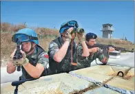  ?? PHOTO PROVIDED FOR CHINA DAILY ?? Left: A Chinese engineerin­g team with UN peacekeepi­ng forces conducts a drill in Lebanon.