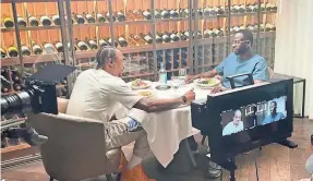  ?? PODIUM PICTURES ?? Chicago Bulls forward DeMar DeRozan, left, sits with the Golden State Warriors’ Draymond Green as part of the new series “Dinners With DeMar.”