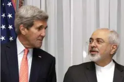  ?? BRIAN SNYDER/THE ASSOCIATED PRESS ?? U.S. Secretary of State John Kerry in one of many meetings with Mohammad Javad Zarif in Lausanne, Switzerlan­d.