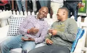  ?? Picture: ISOZAMA PRODUCTION­S ?? LAUGH OUT LOUD: Mthunzi Mali, left, and Monwabisi Daniels have a good laugh at Spring Fiesta last Saturday at B-Man’s Lounge