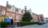  ??  ?? ABOVE: Thomas’s Battersea school. TOP: On his first day, Prince George and his father, Prince William, are greeted by the Head of Lower School, Helen Haslem.