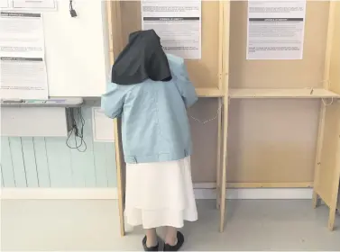  ??  ?? Faith matters: Sister Victor a dominician nun votes in the referendum in Dublin