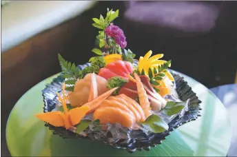  ?? ?? The ‘Sashimi Deluxe’ is one of the more popular sushi dishes available as Sushi Siam.