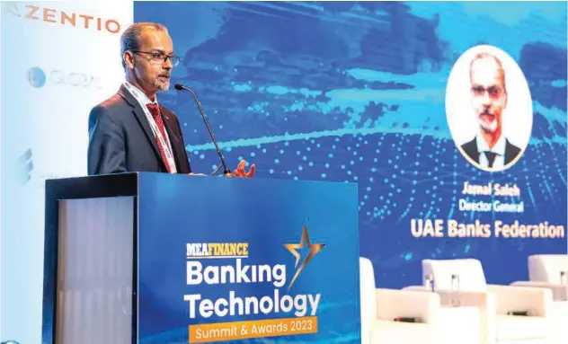  ?? ?? ↑
Jamal Saleh delivers the opening address at the MEA Finance Banking Technology Summit in Dubai.