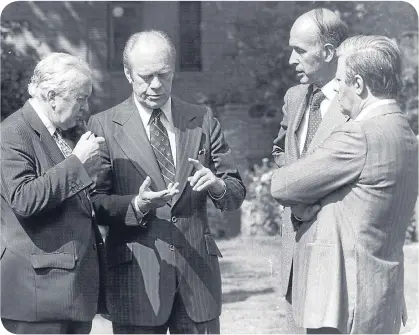  ??  ?? President Gerald Ford, second left, with Prime Minister Harold Wilson, French President Giscard D’Estaing and West Germany’s President Helmut Schmidt at a conference in 1975.
