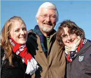  ?? ?? Lord Jones of Cheltenham pictured with his daughters Lucy (left) and Amy (right) during Cheltenham Town’s FA Cup Fourth Round match against Newcastle United in 2006