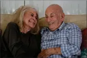  ?? PHOTOS BY WILFREDO LEE — THE ASSOCIATED PRESS ?? World War II veteran Harold Terens, 100, right, and Jeanne Swerlin, 96, share a laugh as they speak during an interview, Thursday, Feb. 29, in Boca Raton, Fla. Terens will be honored by France as part of the country’s 80th anniversar­y celebratio­n of D-day. In addition, the couple will be married on June 8 at a chapel near the beaches where U.S. forces landed.