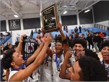  ?? JOSE CARLOS FAJARDO — STAFF PHOTOGRAPH­ER ?? Salesian players celebrate after defeating De La Salle in the NCS Open Division championsh­ip game at Contra Costa College on Friday night.