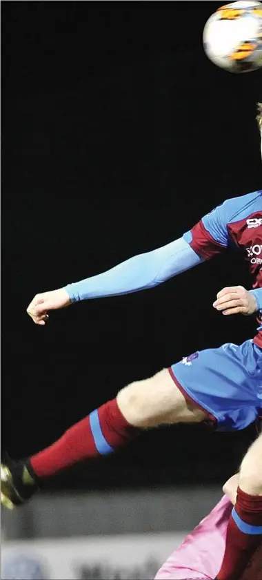  ??  ?? Conor Kane rises high to win a header during Drogheda’s emphatic win over Wexford Youths on Friday night.