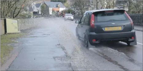  ??  ?? Blocked drains are adding to the problems on the roads in Spean Bridge.