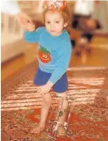  ?? // ABC ?? Oksana Masters, con la handbike (arriba), y en su infancia