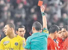  ?? — AFP photo ?? Mbappe (left) reacts as the referee gives him a red card during the French League Cup semi-final match between Rennes and Paris Saint-Germain at the Roazhon Park stadium in Rennes in this Jan 30 file photo.