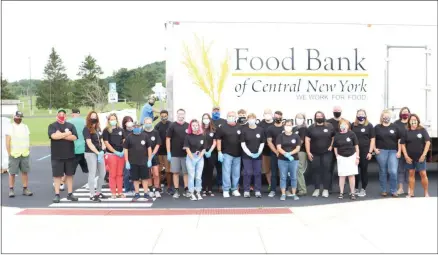  ?? PHOTO PROVIDED ?? CCE Madison staff, Board of Directors and other volunteers coordinate­d a successful Nourish NY food distributi­on in Morrisvill­e in September of 2020 handing out fresh local produce to around 700 families.