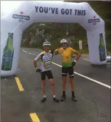  ??  ?? Photo of Padraig O’Shea (right) and Dan O’Sullivan, both of Over the water in Cahersivee­n at Moll’s Gap in the Ring of Kerry Cycle.