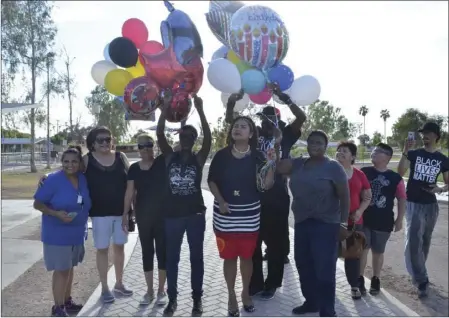  ?? PHOTO ?? Charla Huggins (fourth from left) is joined by friends and supporters on Tuesday at Bucklin Park for a memorial celebratin­g the birthday of her son, Avory Glover, who was killed in a hit-and-run collission in El Centro on April 4, 2015. Avory would...