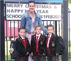  ??  ?? Left: It was a triple treat for teachers at St Thomas Aquinas College at Tynong when six-year-old triplets Nicholas, Timothy and Oliver arrived at school on their first day with mum Claire Robinson of Nar Nar Goon. They join big brother Matthew who is in grade two at the school.