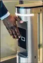  ?? JARED SOARES / NYT ?? Kastle Systems is modifying an app that can open doors and let employees call an elevator and indicate the floor they want to go to without touching any buttons.