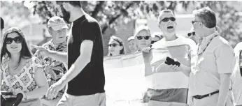  ?? TODD MCINTURF, DETROIT NEWS, VIA AP ?? Friends, family members and supporters participat­e in the 1st Annual Grosse Pointe Pride March on June 11 in conjunctio­n with National Pride Day.