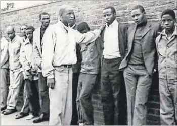  ??  ?? Fruits of freedom: Phineas Mahlangu (above) was forced by police to identify his relative Solomon Mahlangu in a line-up. Solomon Mahlangu was hanged on April 6 1979. He had not shot anyone but the judge found the principle of common purpose applied. On...