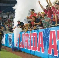  ?? JENNIFER LETT/SOUTH FLORIDA SUN SENTINEL ?? Owl fans cheer for their home team during a game at FAU Stadium in Boca Raton on Oct. 18, 2019.